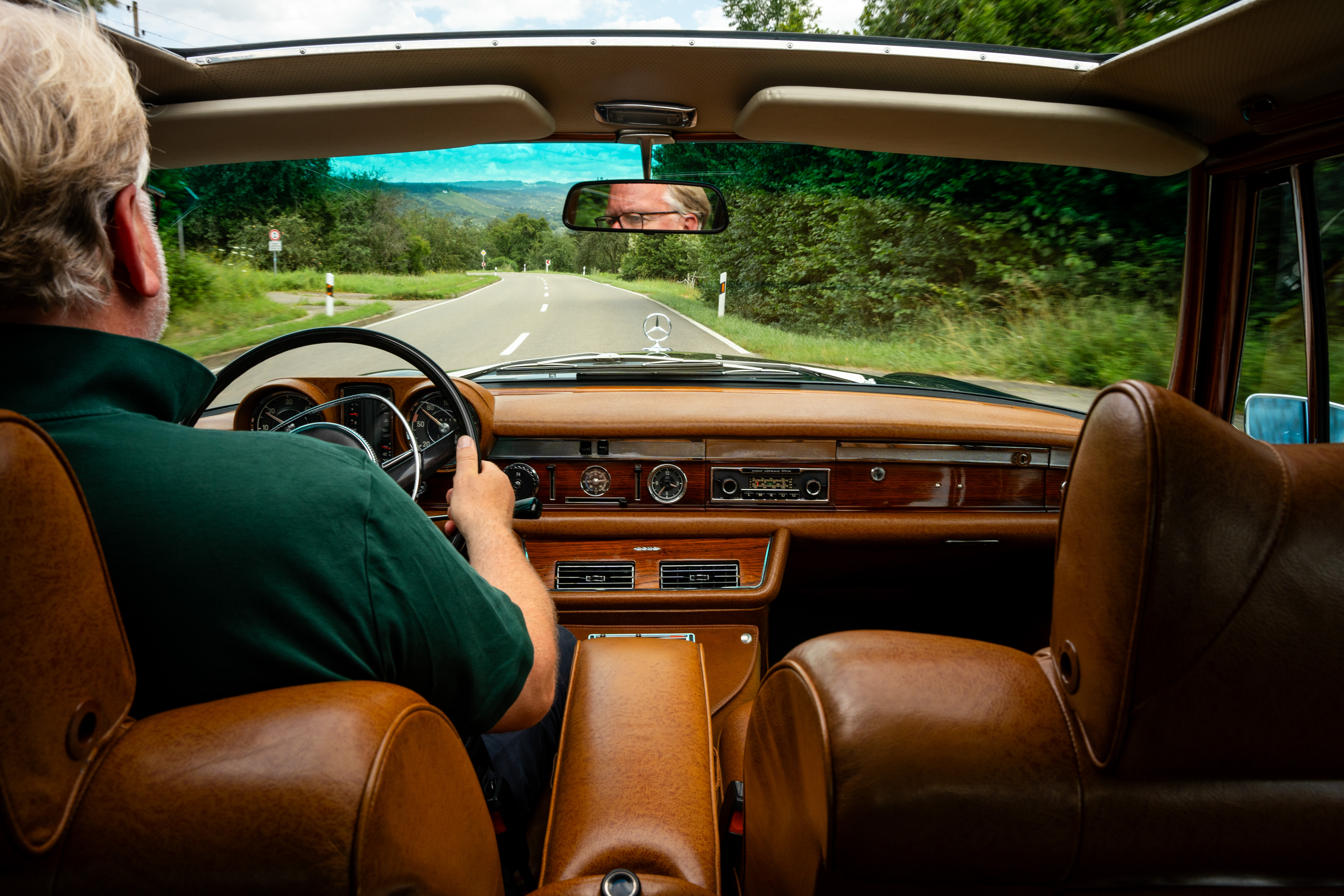 Axel Catton driving a car, 3