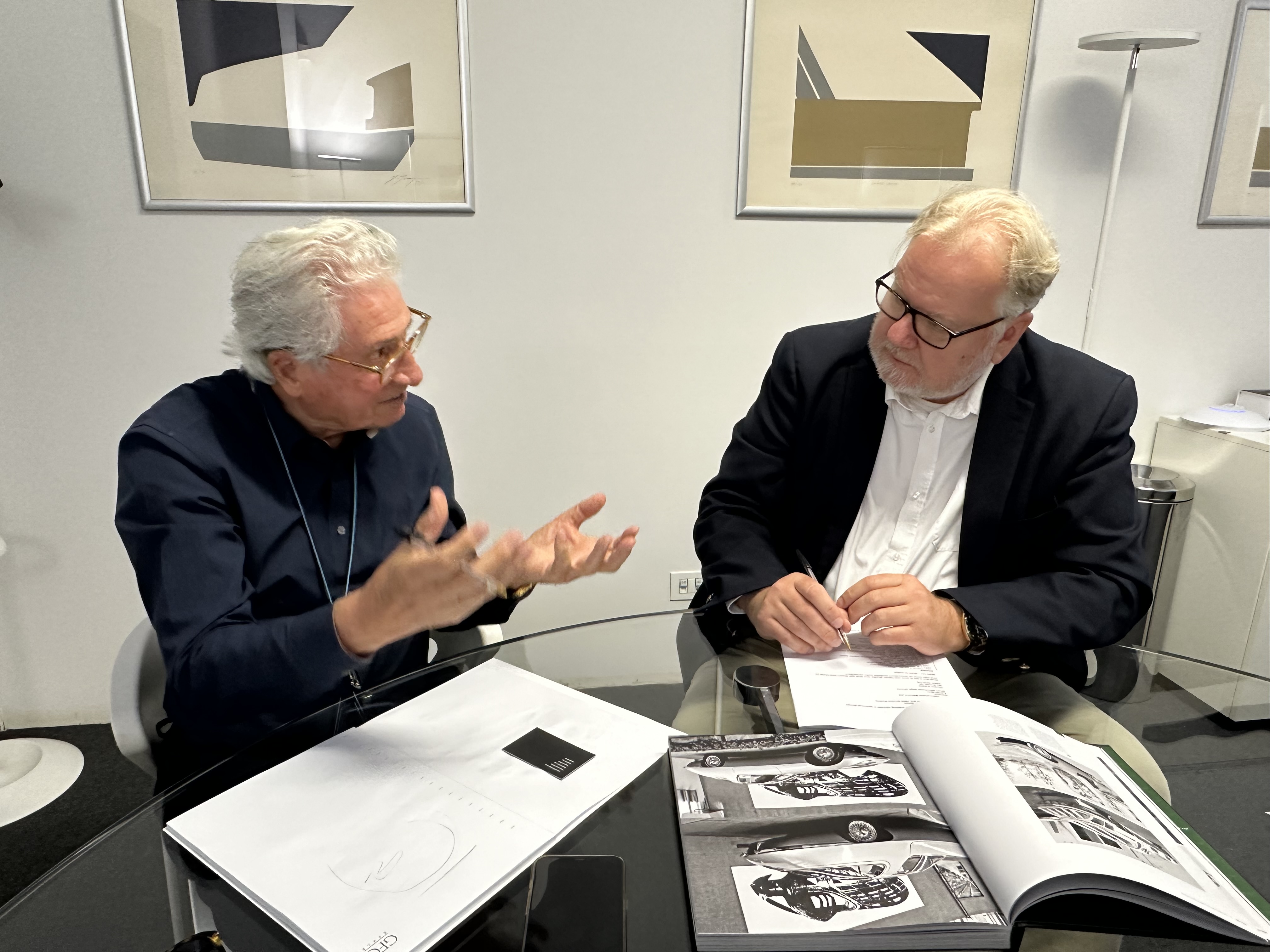 Axel Catton driving a car, 4